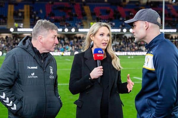 Rhinos coach Rohan Smith, right and Hull boss Tony Smith are interviewed by Sky TV's Jenna Brooks before the sides' meeting at Headingley in February. Picture by Allan McKenzie/SWpix.com.