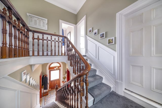 Upon entry into the formal entrance hall, the property boasts original Victorian tiling with a beautiful oak staircase sweeping up to a galleried landing, with a return up to the first floor.