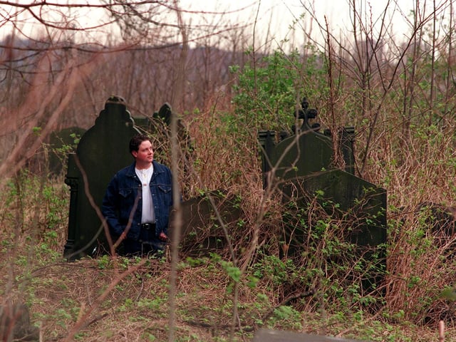 Andrew Sproule pictured in the disused graveyard at St Mark's Church in Woodhouse.