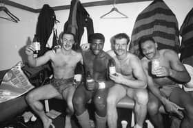 Paul Dixon, third from left, celebrates with fellow Leeds players (left-right)  Garry Schofield, Roy Powell and Carl Gibson in the Wembley changing room after Great Britain's win over Australia in 1990. Picture by Steve Riding.