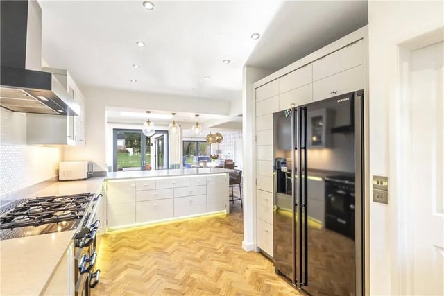 This extended home has an impressive modern fitted kitchen which leads through to a large open plan family, dining area.