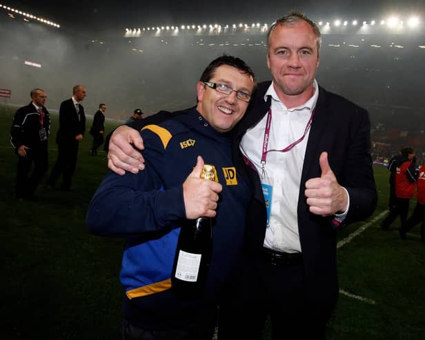 Jason Davidson, left and Brian McDermott after Leeds Rhinos' 2011 Grand Final win against St Helens at Old Trafford. Picture by Vaughn Ridley/SWpic.com.