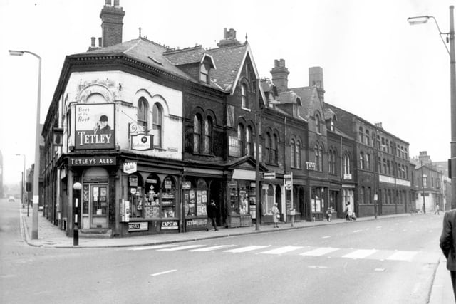 Meanwood Road in August 1967, On the left is Cambridge Road looking up to the left junction with Woodhouse Street. The off licence shop was run by Edward Moran and was 177 Meanwood Road. The zebra crossing was to assist children attending Meanwood Road School to cross safely. The school was on the right, out of view of this scene.