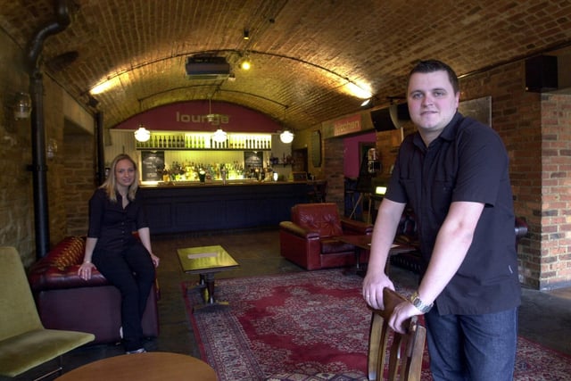 The interior of the Aire Pub on The Calls, Leeds. Pictured is Hayley Gallacher, a member of the bar staff, with Dan Burkitt, manager, on April 12, 2002.
