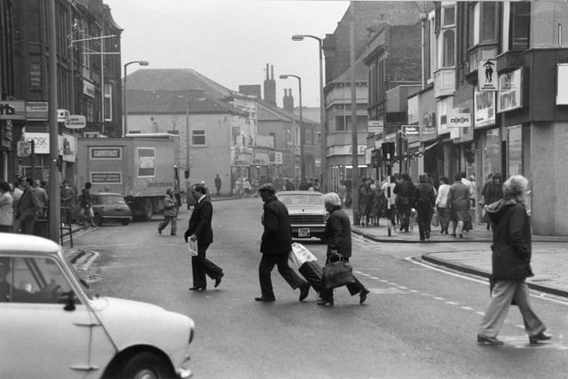 Pedestrians cross Carlton Street in November 1982.