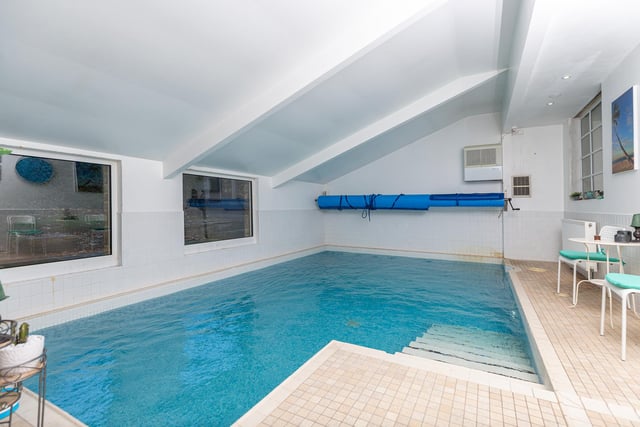 The house has its own indoor swimming pool with shower.