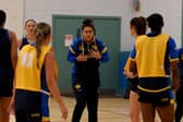 Learning on their feet: Lauren Palmer puts her Leeds Rhinos team through their paces during a training session at Leeds YMCA.