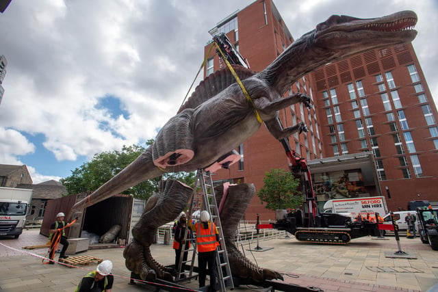 An excited looking dinosaur is about to have its legs reattached - but what could this mean for innocent bystanders?
