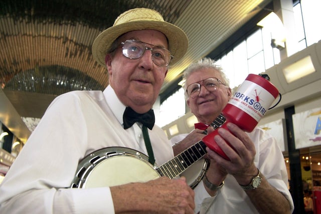 Pudsey Plonkers Brian Webb and Denis Wilson play their ukulele at Cross Gates Shopping Centre in January 2003 to raise money for the Yorkshire Air Ambulance.
