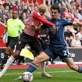 IMPROVED DISPLAY - Southampton's Kyle Walker-Peters (left) and Leeds United's Pascal Struijk (right) battle for the ball during the Sky Bet Championship match at St Mary's Stadium, Southampton. Struijk was among Leeds' best players in the second half. Pic: George Tewkesbury/PA Wire