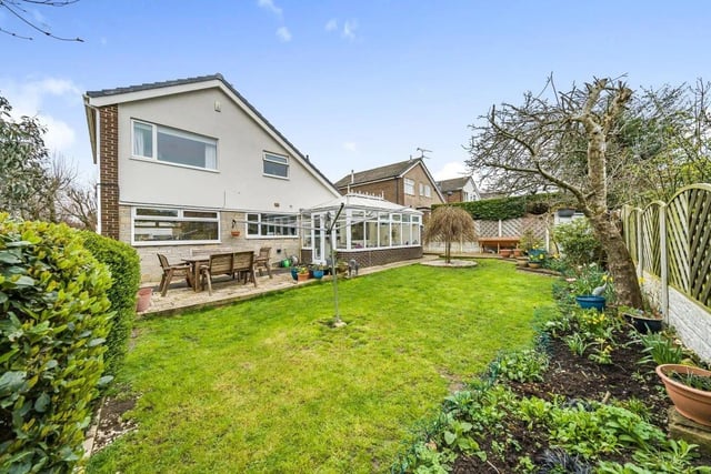 The rear garden area is south-west facing and provides a secure yet open space. The lawn and beds are well established and offer a space to play, entertain or relax.
