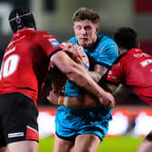 Liam Sutcliffe in action for Huddersfield Giants against Salford Red Devils last season. Picture by Olly Hassell/SWpix.com.