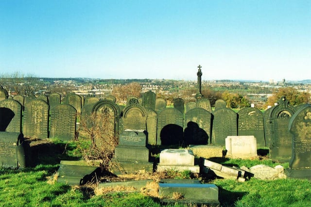 'Guinea Graves' that can be seen in Holbeck Cemetery. In contrast to the more ornate memorials these are simple stone slabs which have been inscribed with a long list of names and ages of people in the locality who died in poverty.