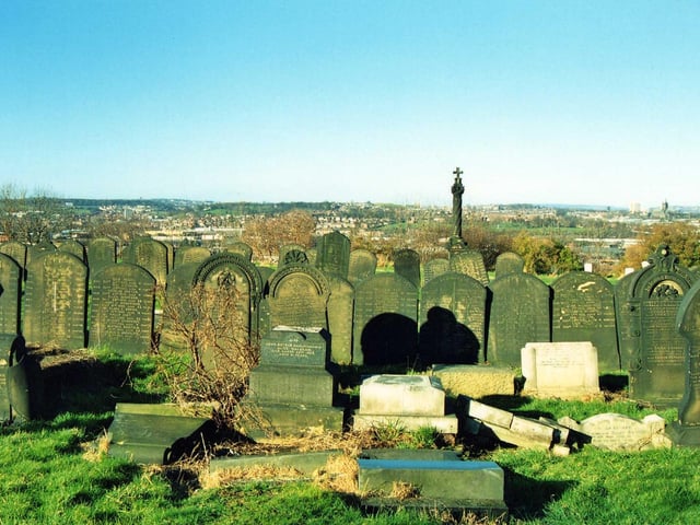 'Guinea Graves' that can be seen in Holbeck Cemetery. In contrast to the more ornate memorials these are simple stone slabs which have been inscribed with a long list of names and ages of people in the locality who died in poverty.