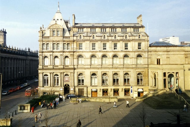 The Municipal Buildings on The Headrow, which at the time housed the Central Library and City Museum and also Stumps public house in the basement. The museum vacated the building in 1999 and the city centre was then without a museum for several years until the new museun opened in the former Civic Theatre in September 2008. On the left of the picture are Calverley Street and the Town Hall and on the right the Art Gallery can be seen.
