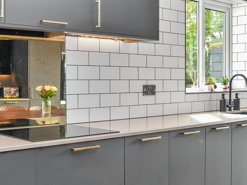 The kitchen area shares the same high-spec finish seen throughout much of the property.