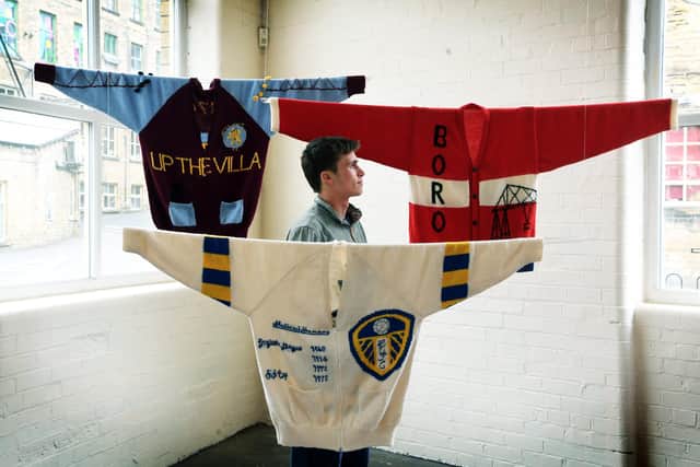 Finlay Semple views work on show in the For The Love Of Textiles exhibition at Sunny Bank Mills. Picture: Jonathan Gawthorpe.