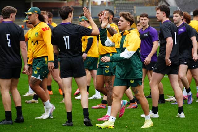 Leeds Beckett University players, in dark shirts, rub shoulders with the Australian national side during a training session at AMT Headingley. Picture by Leeds Beckett University.