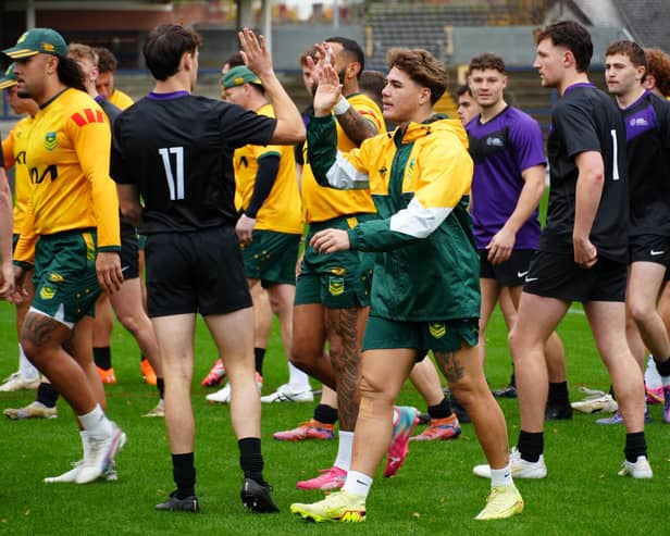 Leeds Beckett University players, in dark shirts, rub shoulders with the Australian national side during a training session at AMT Headingley. Picture by Leeds Beckett University.