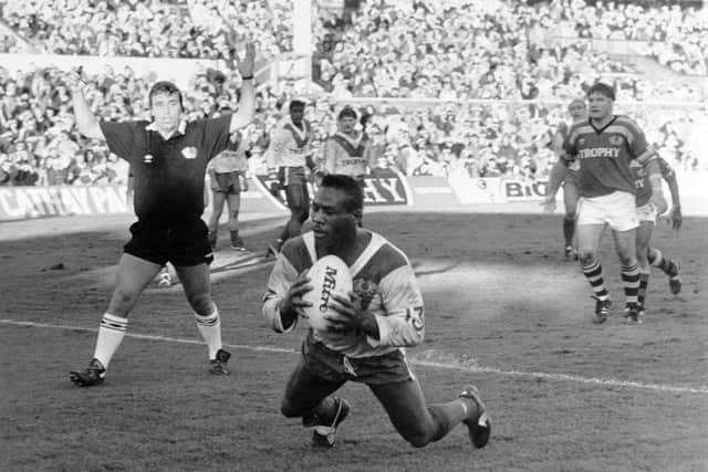John Holdsworth waves play on as Ellery Hanley scores for Great Britain agianst Rest Of The World at Headingley in October, 1988. Picture by YPN.