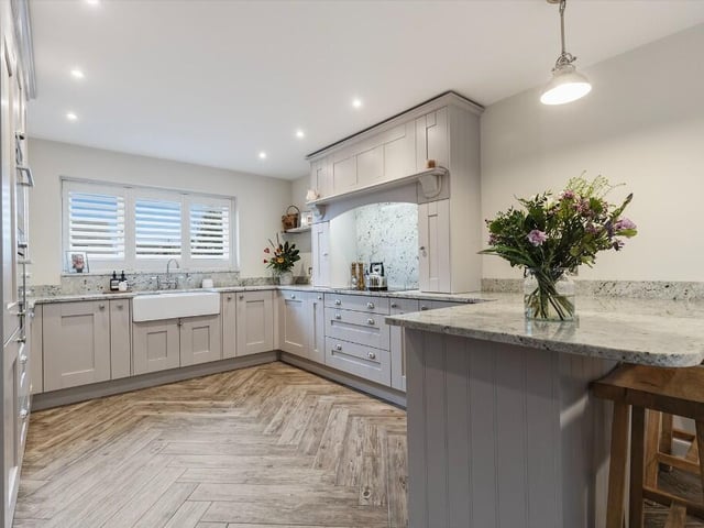 At the heart of the home lies an impressive open plan kitchen, which has been thoughtfully designed for both everyday living and entertaining.