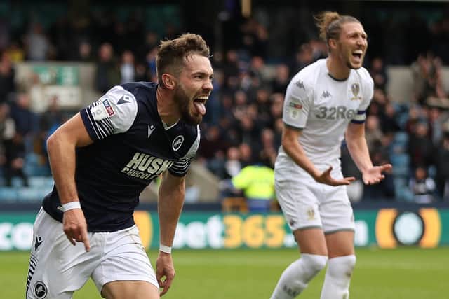 JUICY RETURN: Leeds United defender Luke Ayling, right, reacts as Tom Bradshaw, left, celebrates putting Millwall 2-0 up in the 2-1 victory at The Den of October 2019. 
Photo by Christopher Lee/Getty Images.