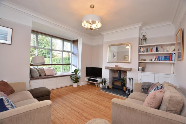 Downstairs, the living room has a bay fronted window with a stripped wooden flooring and a multi-fuel burning stove. The stunning open plan accommodation is dual aspect, with doors leading into the garden.