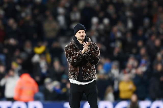 LEEDS, ENGLAND - JANUARY 18: Mateusz Klich of Leeds United, who is leaving Leeds United to join D. C. United, acknowledges the fans prior to the Emirates FA Cup Third Round Replay match between Leeds United and Cardiff City at Elland Road on January 18, 2023 in Leeds, England. (Photo by Michael Regan/Getty Images)
