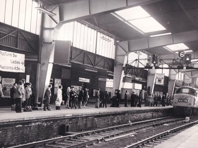Passengers play the waiting game on a platform at Leeds City Station in May 1972.