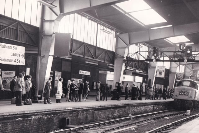 Passengers play the waiting game on a platform at Leeds City Station in May 1972.