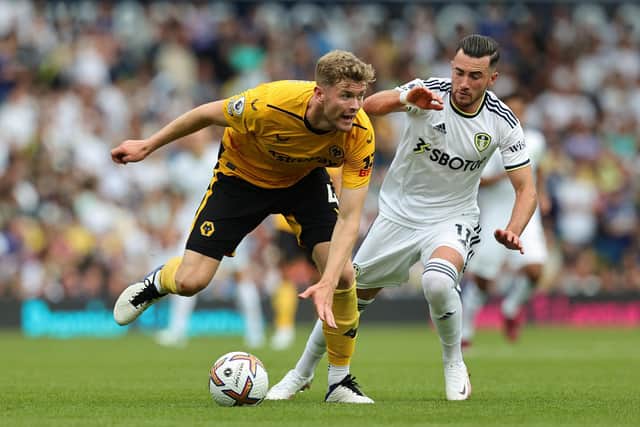 ELLAND ROAD REGRETS: For Wolves defender Nathan Collins, left, pictured being challenged by Leeds United's Jack Harrison in Saturday's 2-1 defeat.
Photo by David Rogers/Getty Images.