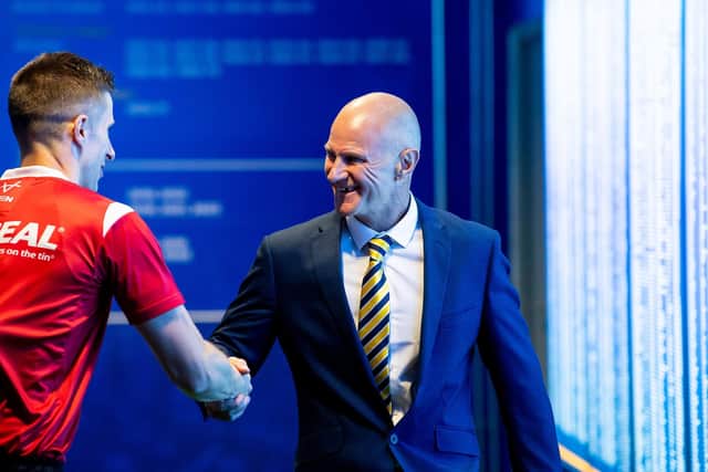 Referee Chris Kendall shakes hands with Rhinos coach Brad Arthur before Leeds' home win against Warrington Wolves in June. Picture by Allan McKenzie/SWpix.com.