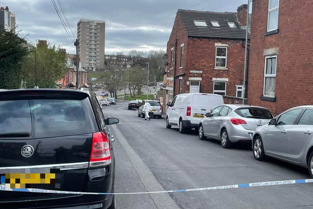 A police cordon remains in place at Salisbury Grove, Armley, as investigators continue to gather evidence at the scene.
