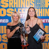 Mel Howard, right, receives the women's player of the year trophy from Leeds Rhinos president Gill Spencer. Picture by Tom Pearson/Leeds Rhinos.
