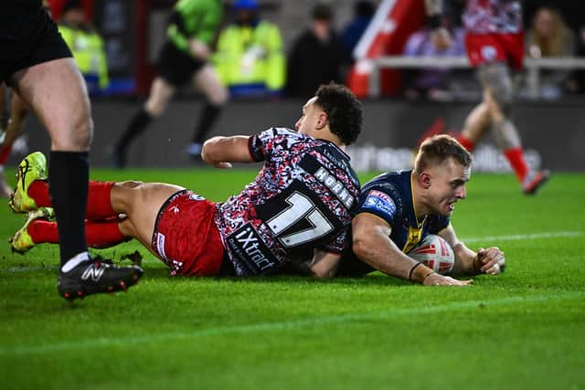 Cooper Jenkins scores for Leeds Rhinos in their 26-14 loss at Leigh Leopards. Picture by Olly Hassell/SWpix.com.