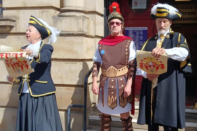 Castelford's new town criers, Barbara Hughes and Paul Carr, made their first appearance at the town's Roman Festival. Image: Castleford Civic Society.