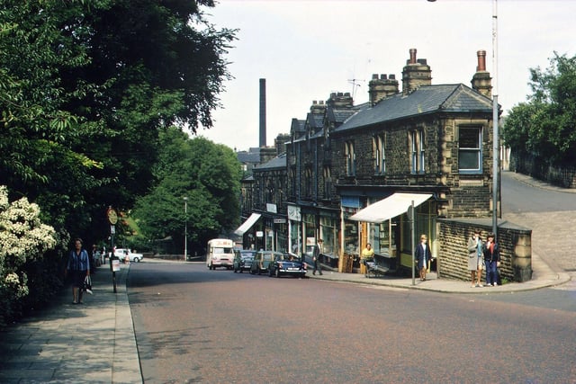 Scatcherd Hill from Coffin Corner in August 1967, giving a similar view to 60 years earlier when the wall of Morley House stretched all down the left hand side pavement. The picture was taken at a time when the parade of shops on the right still catered for traditional Morley goods.