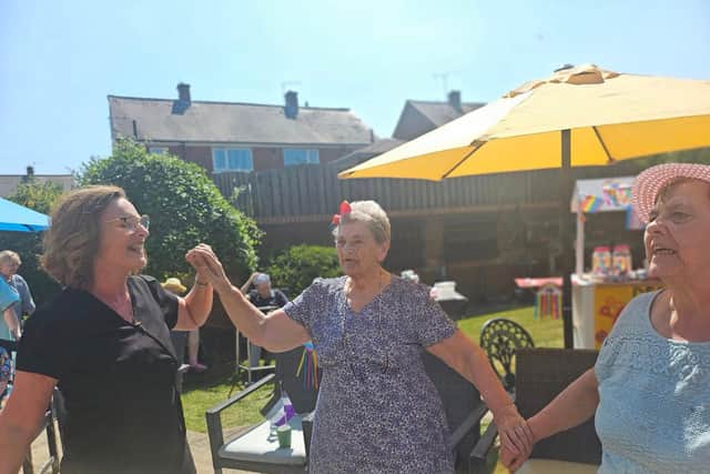 Residents and colleagues celebrating