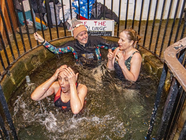 Jane Harris, Charlie Gill and Helen Khan brave the cold water in the plunge pool at White Wells on Ilkley Moor