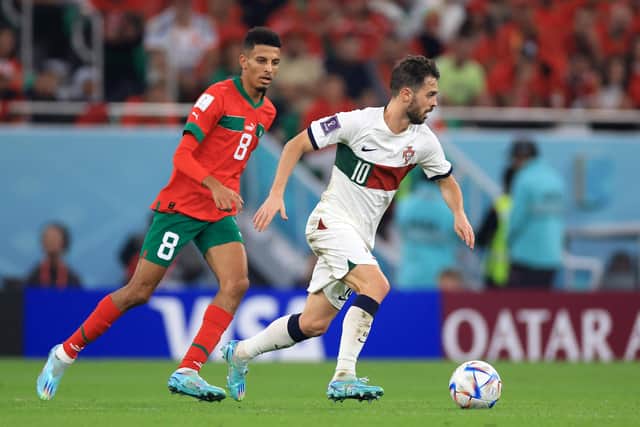 BREAKOUT STAR - Bernardo Silva of Portugal is challenged by Morroco's Azzedine Ounahi, a player impressing Leeds United owner Andrea Radrizzani during the World Cup. Pic: Getty