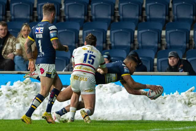 A pass from Richie Myler set up David Fusitu'a to score Rhinos' first try against Wakefield.  Picture by Bruce Rollinson.