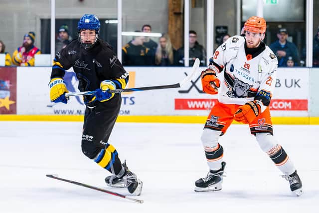 DERBY DUEL: Leeds' Edgars Vengis and Sheffield's Nathan Ripley battle for posession at Elland Road on Saturday. Picture: Kev Bland/Knights Media.