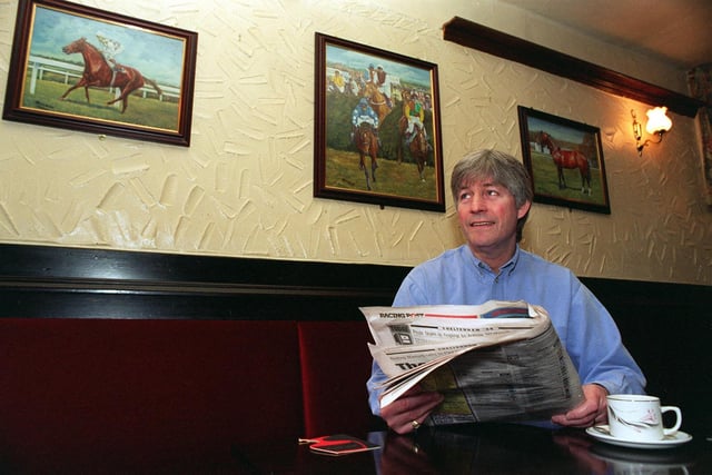 Studying the form in March 1998. Former footballerJim McCalliog pictured at the George and Dragon pub in Wetherby where was the landlord.