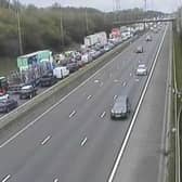 All traffic has been stopped on the M62 westbound due to a vehicle fire