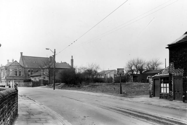 Beeston County Primary School and K.Burtons, plumbers on Town Street pictured in April 1955.