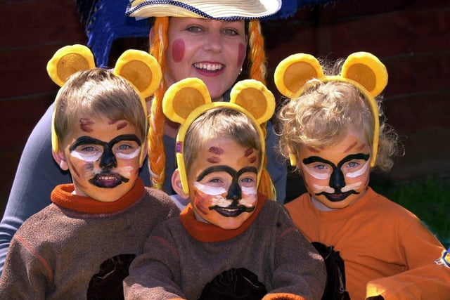 Julie Atha with her triplets James, Liam and Chloe dressed in their Goldilocks and the three bears outfits in May 2001.