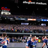 Leeds Rhinos players celebrate with their fans following the win against Hull KR at Allegiant Stadium in Las Vegas three months ago. Picture by Alex Whitehead/SWpix.com.