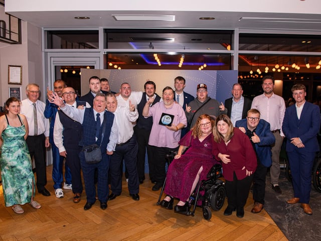 Leeds Rhinos Learning Disabilities Super League team with their player of the year Andrew Forth.