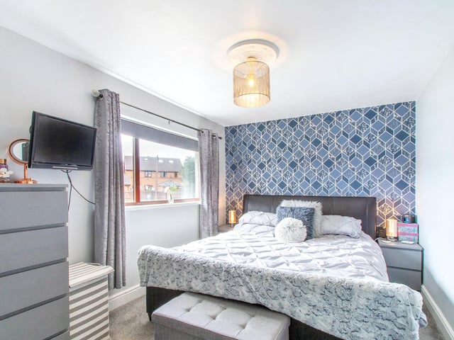 To the first floor are two double bedrooms, both with built-in wardrobe space, and a family bathroom.