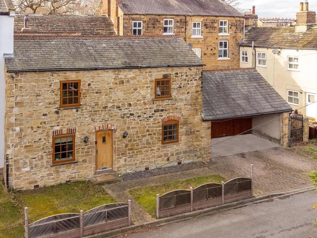 This unique stone-built property steeped in history is in a sought-after village location.